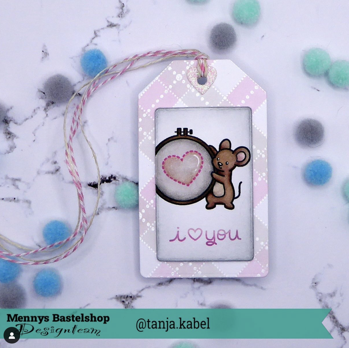 Maus und Stickrahmen